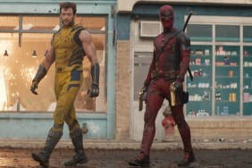 Wolverine and Deadpool walk down the street.